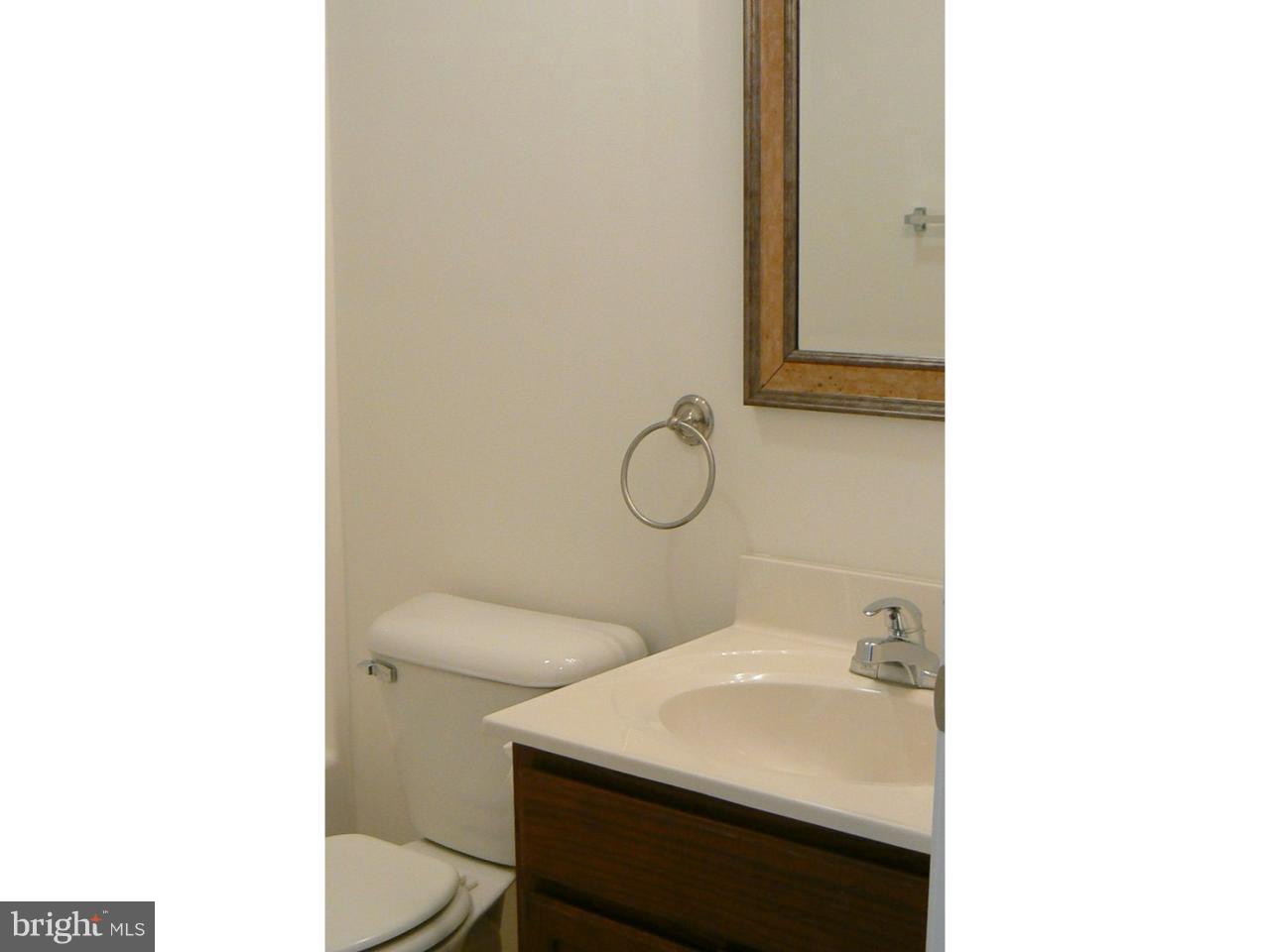 226 Pine Street Dover, DE 19901 - Photo 14 of 20 a bathroom with a sink toilet and mirror