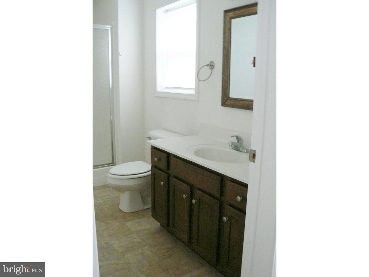 226 Pine Street Dover, DE 19901 - Photo 16 of 20 a bathroom with a sink and a toilet
