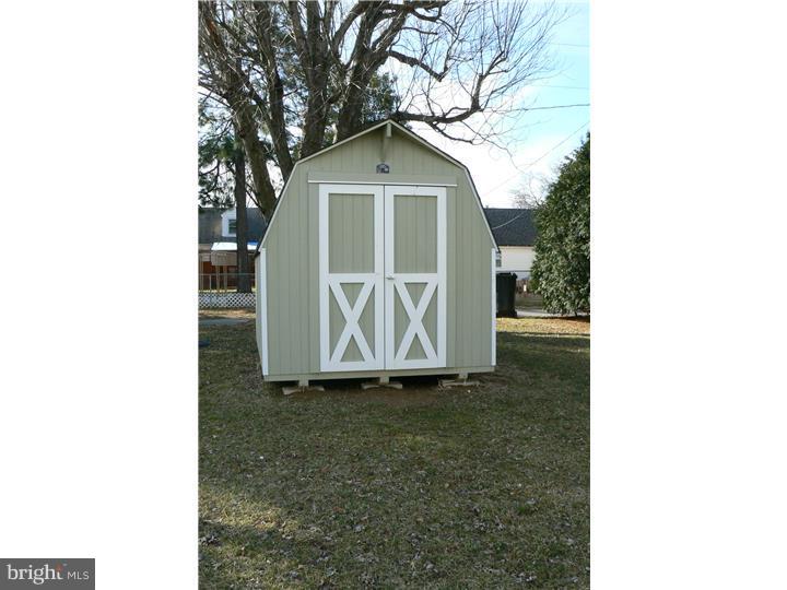 226 Pine Street Dover, DE 19901 - Photo 19 of 20 a view of a house with a yard