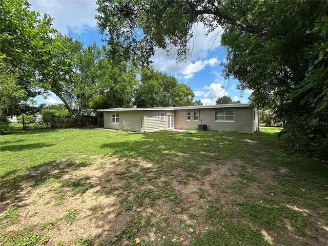 a view of a backyard with a garden