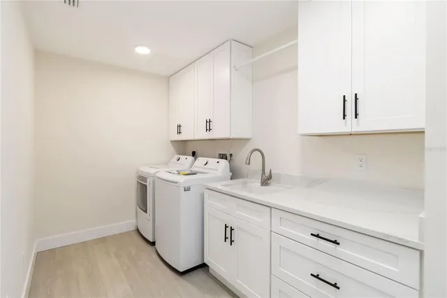 a view of cabinets with white cabinets