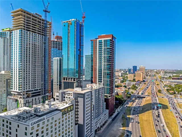 a city view with tall buildings