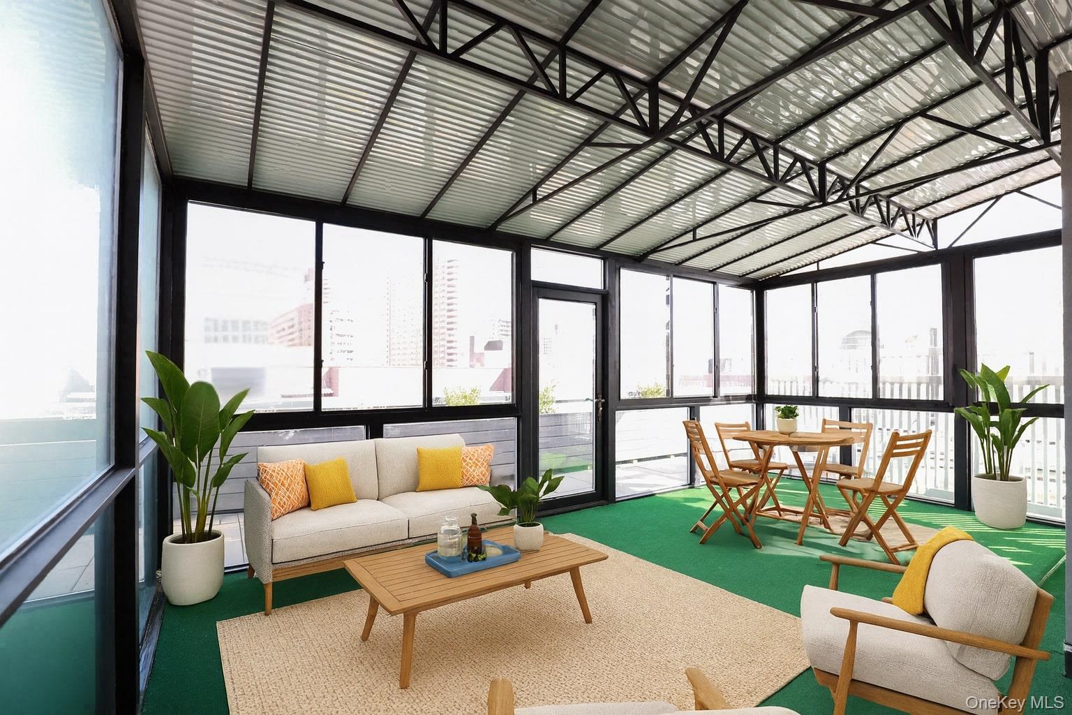 42-78 Main Street, Unit 6E Queens, NY 11355 - Photo 21 of 33 a living room with furniture and a large window