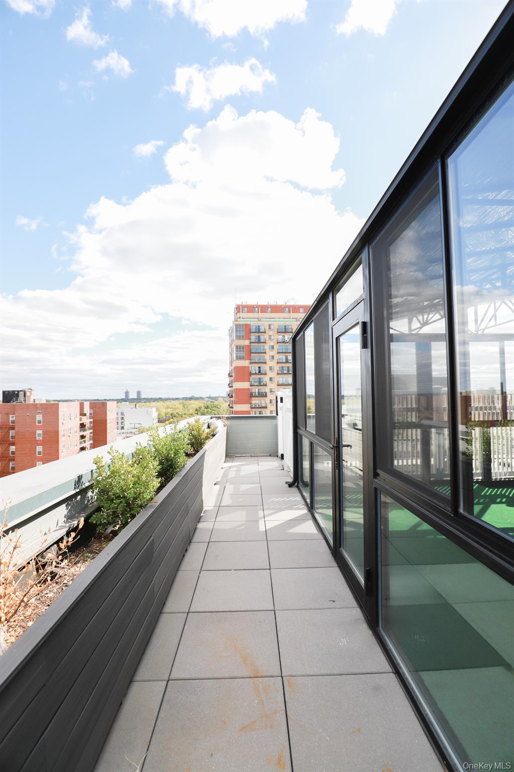 42-78 Main Street, Unit 6E Queens, NY 11355 - Photo 23 of 33 a view of balcony with city view