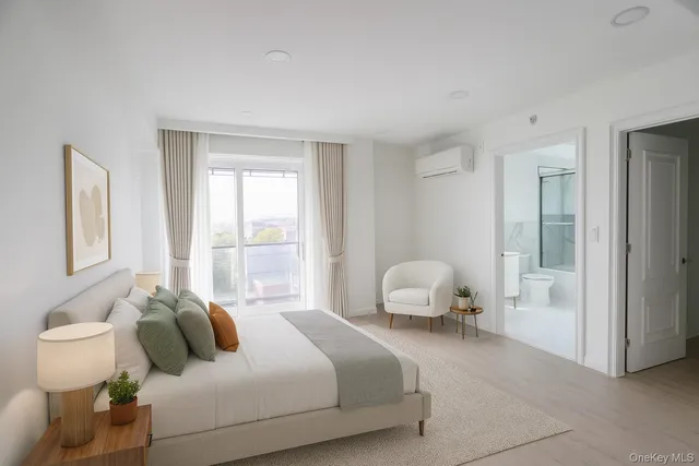 a kitchen with stainless steel appliances kitchen island granite countertop a refrigerator and a stove top oven