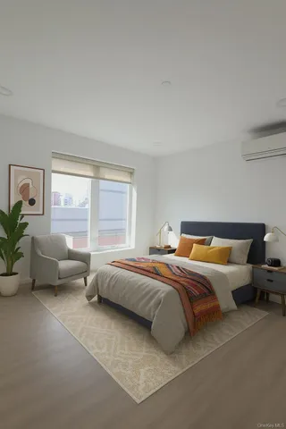 a bedroom with a bed and chair