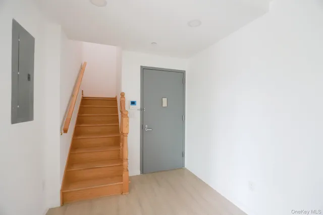 an entryway of a house with stairs