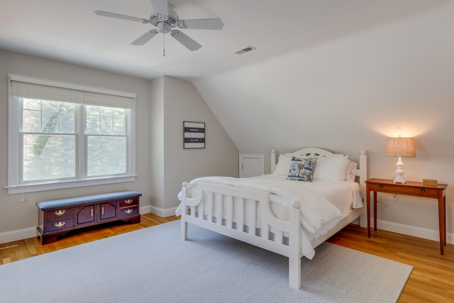 50 Pheasant Way, Unit A&B Centerville, MA 02632 - Photo 20 of 62 a spacious bedroom with a bed a chandelier and a window