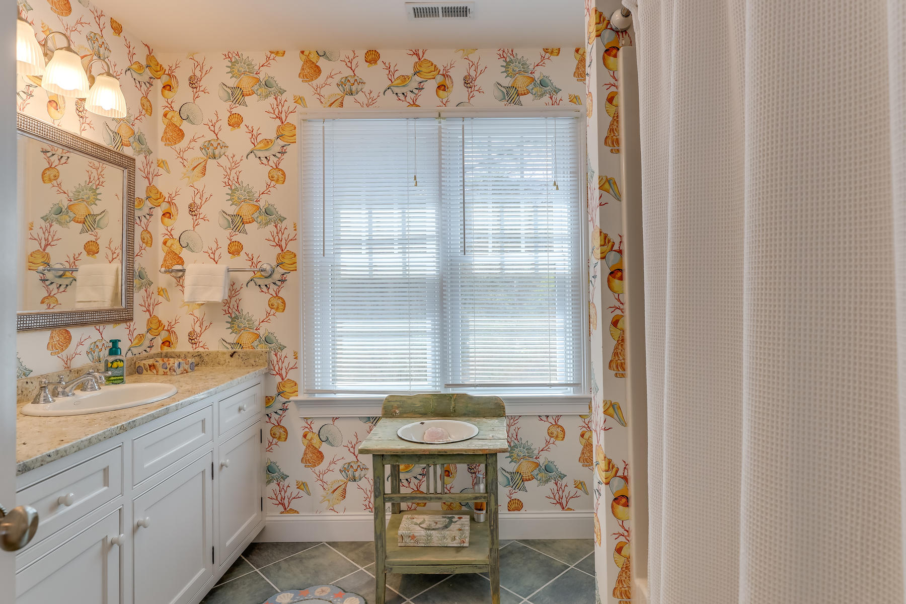 50 Pheasant Way, Unit A&B Centerville, MA 02632 - Photo 22 of 62 a spacious bathroom with a sink mirror and a bathtub