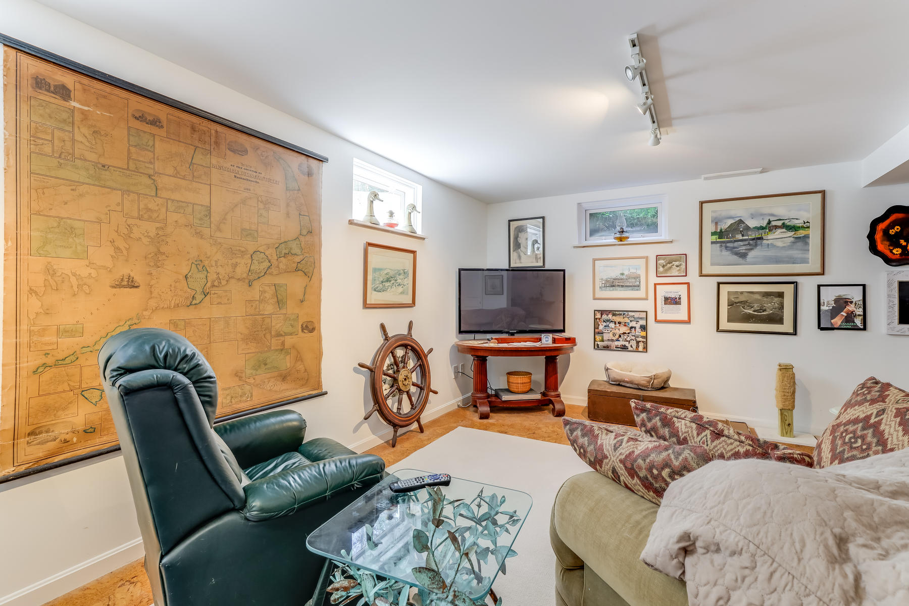 50 Pheasant Way, Unit A&B Centerville, MA 02632 - Photo 25 of 62 a living room with furniture a couch and a flat screen tv