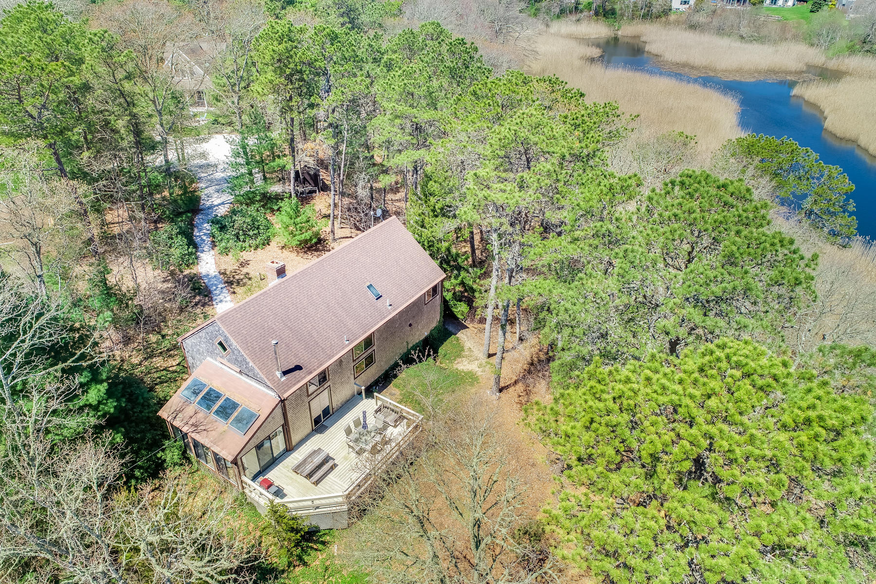 50 Pheasant Way, Unit A&B Centerville, MA 02632 - Photo 59 of 62 an aerial view of a house with a yard and garden