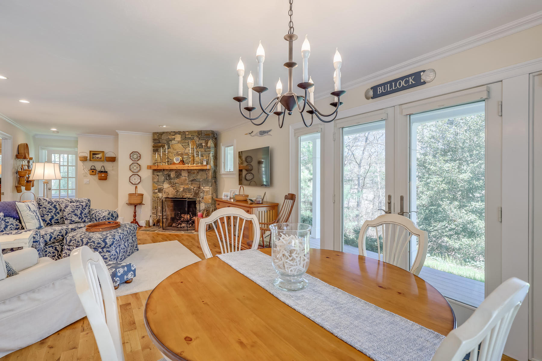 50 Pheasant Way, Unit A&B Centerville, MA 02632 - Photo 6 of 62 a view of a dining room with furniture wooden floor and chandelier