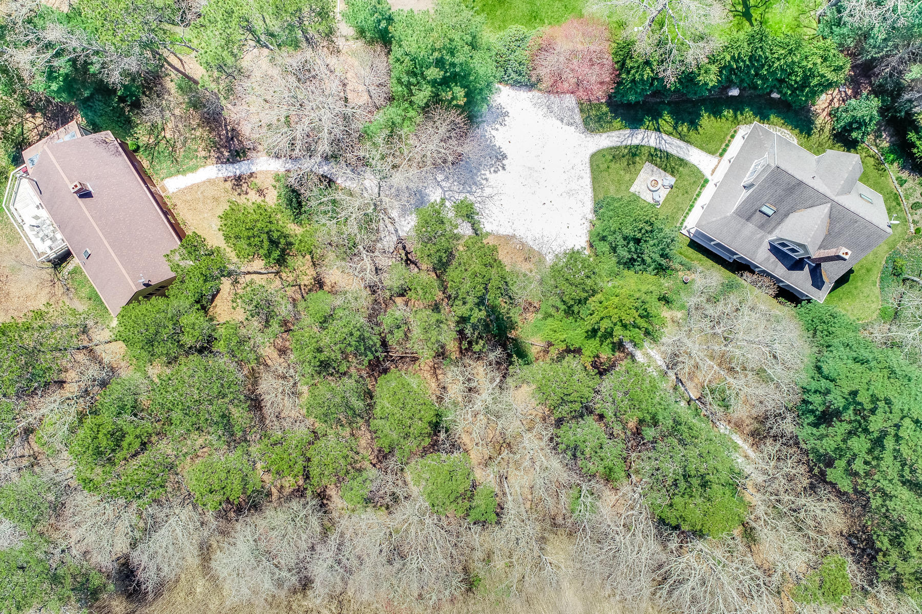 50 Pheasant Way, Unit A&B Centerville, MA 02632 - Photo 61 of 62 an aerial view of a house with a yard and trees