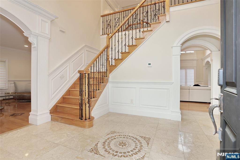 65 Ross Avenue Demarest, NJ 07627 - Photo 3 of 48 a view of staircase with white walls and a rug