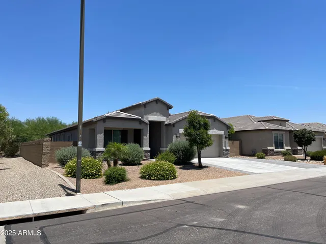 front view of a house with a street