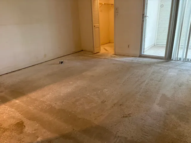 a bathroom with a shower and a shower curtain