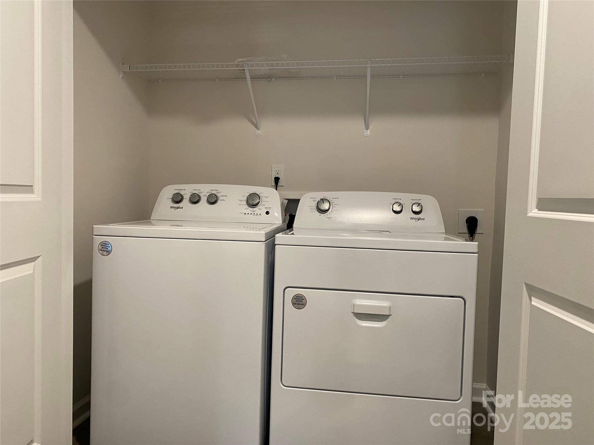 6135 Faron Way Charlotte, NC 28262 - Photo 16 of 23 a utility room with dryer and washer