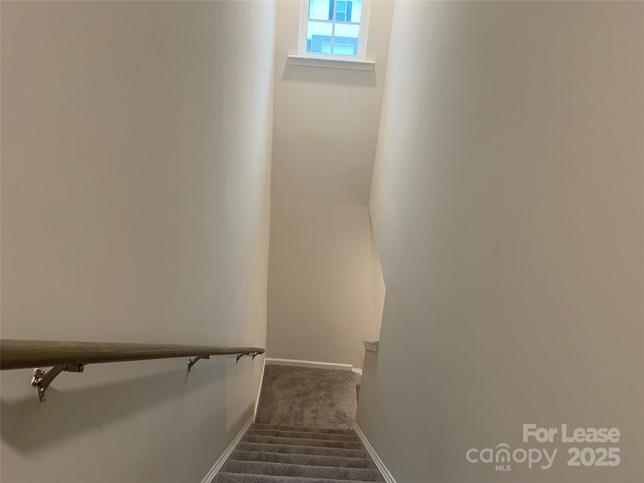 6135 Faron Way Charlotte, NC 28262 - Photo 17 of 23 a bathroom with a bathtub