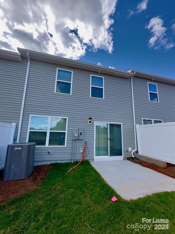 6135 Faron Way Charlotte, NC 28262 - Photo 5 of 23 a view of a house with a backyard