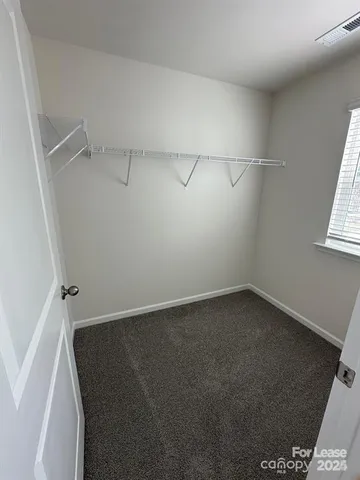 a view of a room with rack on the wall