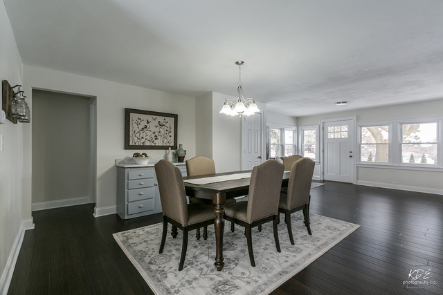 12N234 South Randall Road Elgin, IL 60123 - Photo 13 of 33 a view of a dining room with furniture window and wooden floor