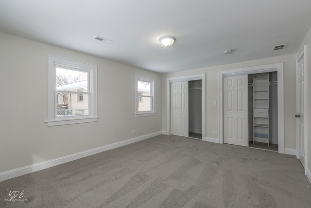 12N234 South Randall Road Elgin, IL 60123 - Photo 15 of 33 a view of an empty room with a window