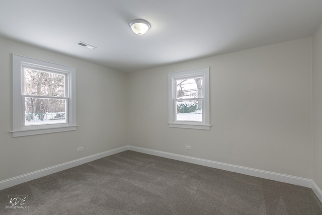 12N234 South Randall Road Elgin, IL 60123 - Photo 16 of 33 an empty room with a window