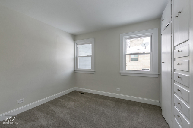 12N234 South Randall Road Elgin, IL 60123 - Photo 19 of 33 an empty room with a window