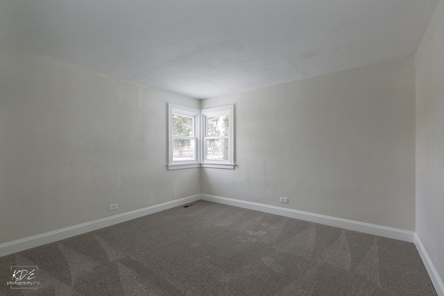 12N234 South Randall Road Elgin, IL 60123 - Photo 21 of 33 an empty room with a window