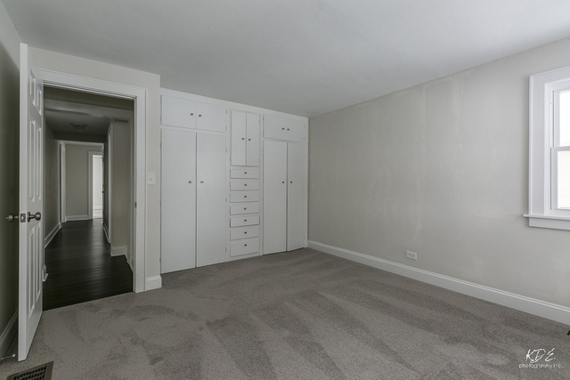 12N234 South Randall Road Elgin, IL 60123 - Photo 22 of 33 a view of an empty room with closet and a window