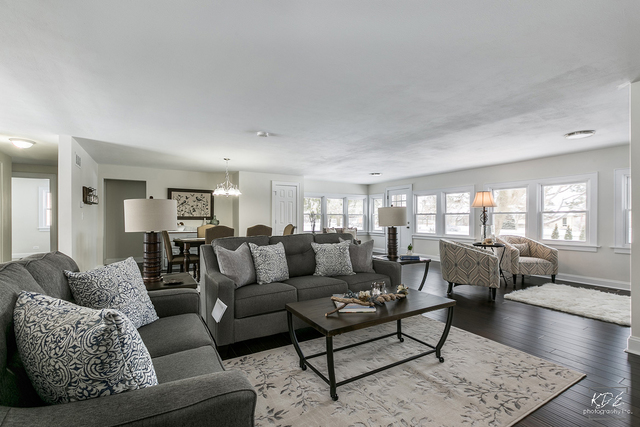 12N234 South Randall Road Elgin, IL 60123 - Photo 7 of 33 a living room with furniture and a large window