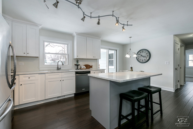 12N234 South Randall Road Elgin, IL 60123 - Photo 10 of 33 a kitchen with a sink cabinets and window