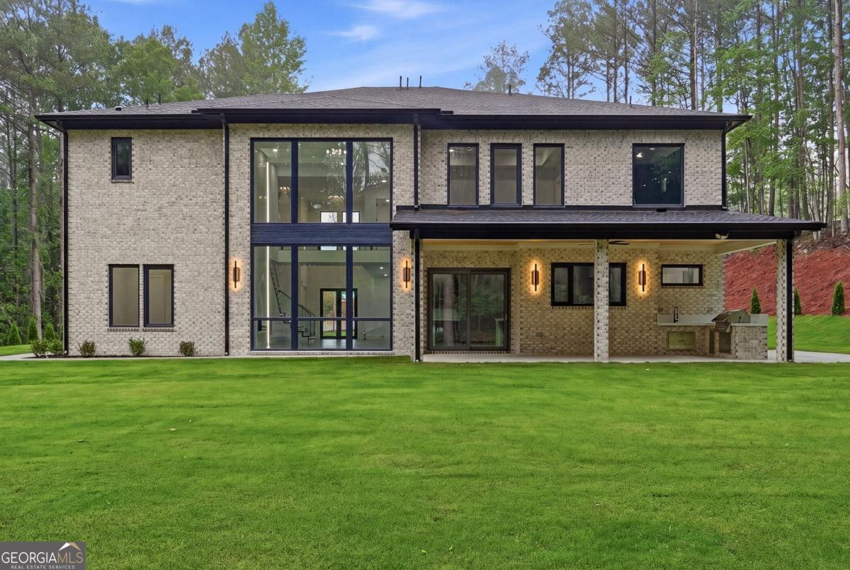 1563 Whitley Road Bethlehem, GA 30620 - Photo 40 of 44 a front view of a house with a garden