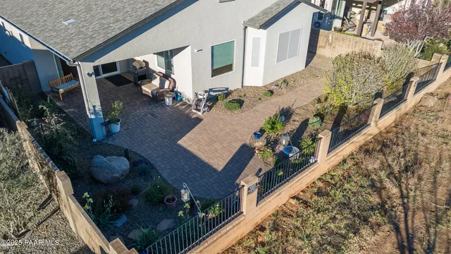 a aerial view of a house with a yard