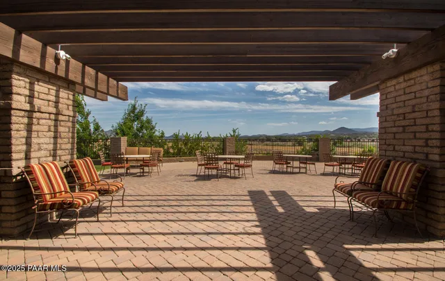 a view of a swimming pool with an ocean view