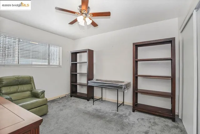 a room with furniture and flat screen tv