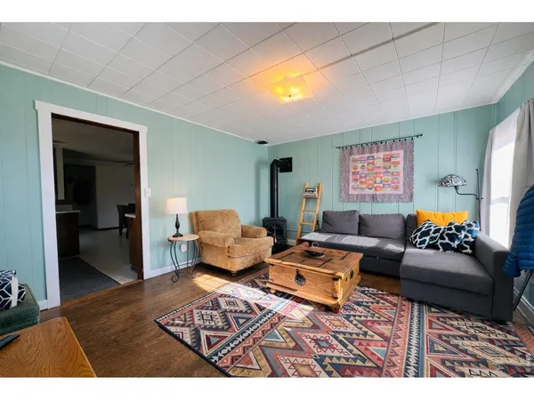 a living room with furniture and a table