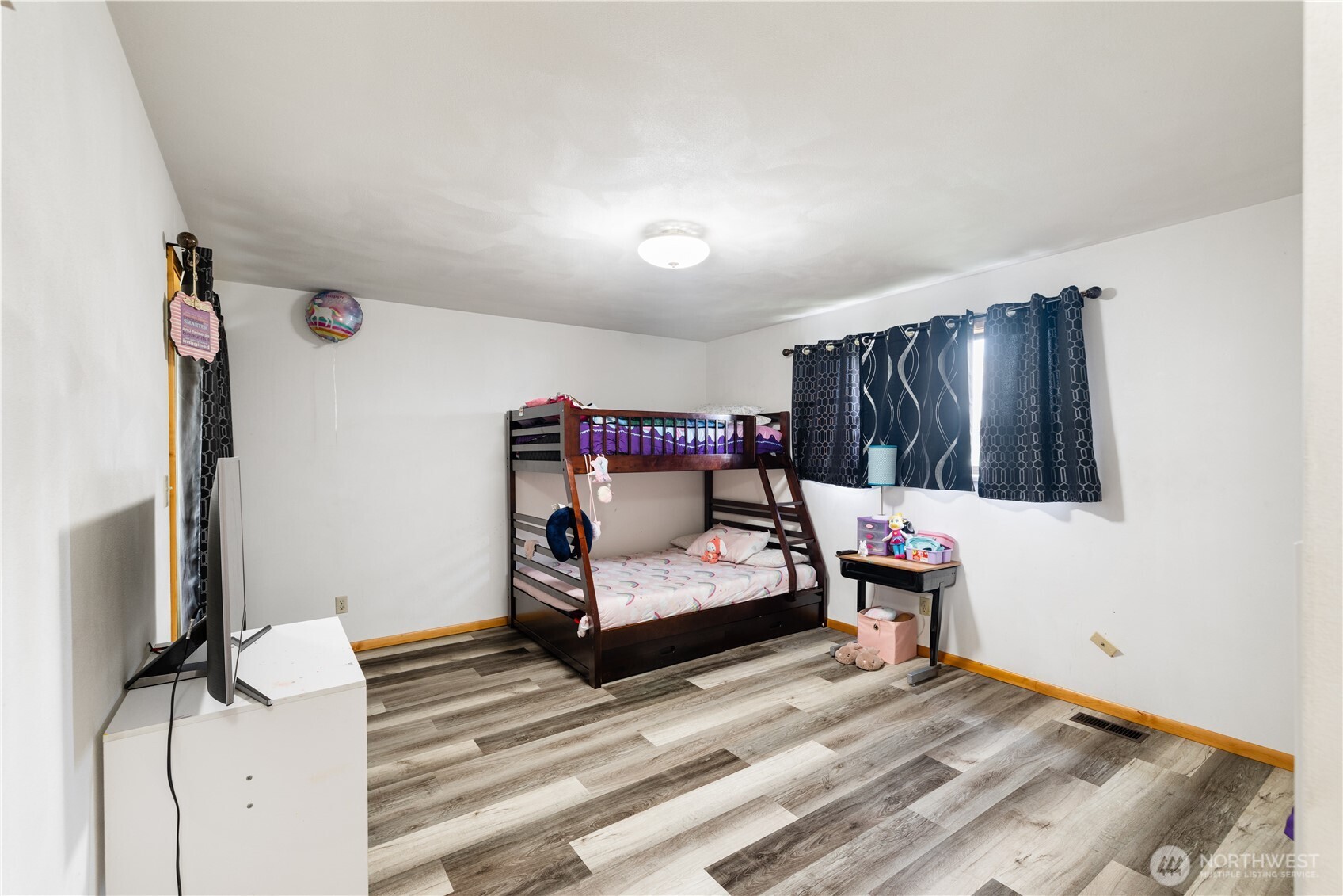 21563-21567 Cook Road Sedro-Woolley, WA 98284 - Photo 15 of 38 a bedroom with a bed and a dresser