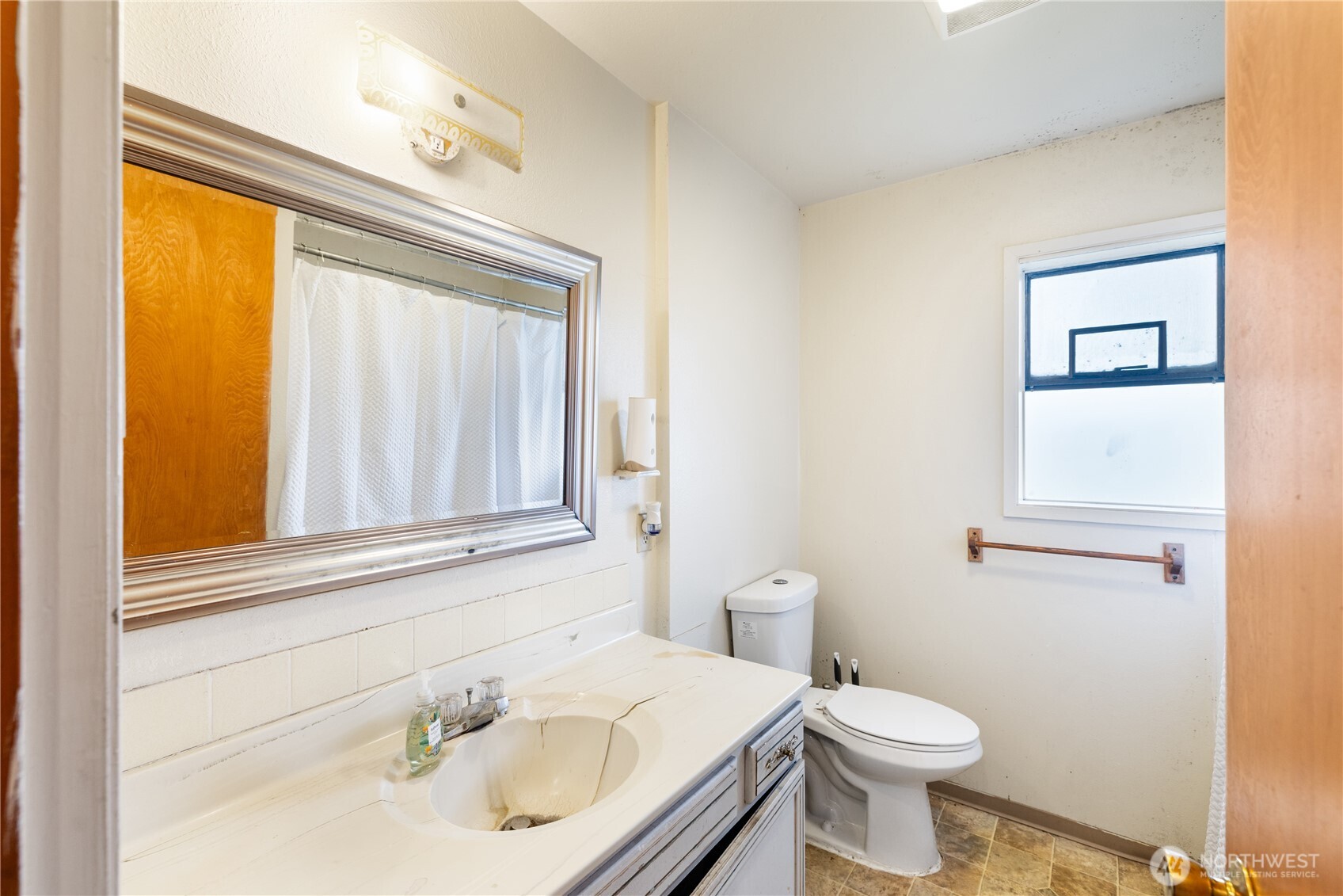 21563-21567 Cook Road Sedro-Woolley, WA 98284 - Photo 24 of 38 a bathroom with a sink and a toilet