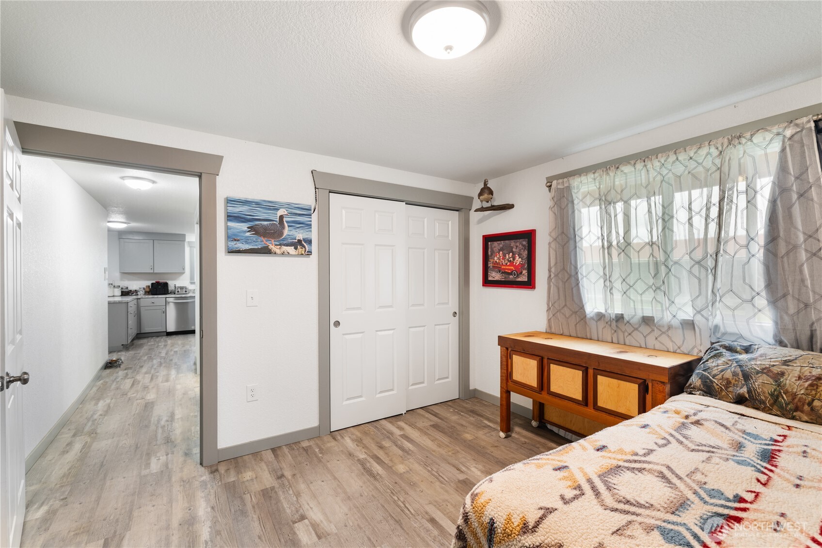 21563-21567 Cook Road Sedro-Woolley, WA 98284 - Photo 30 of 38 a bedroom with a bed and a window