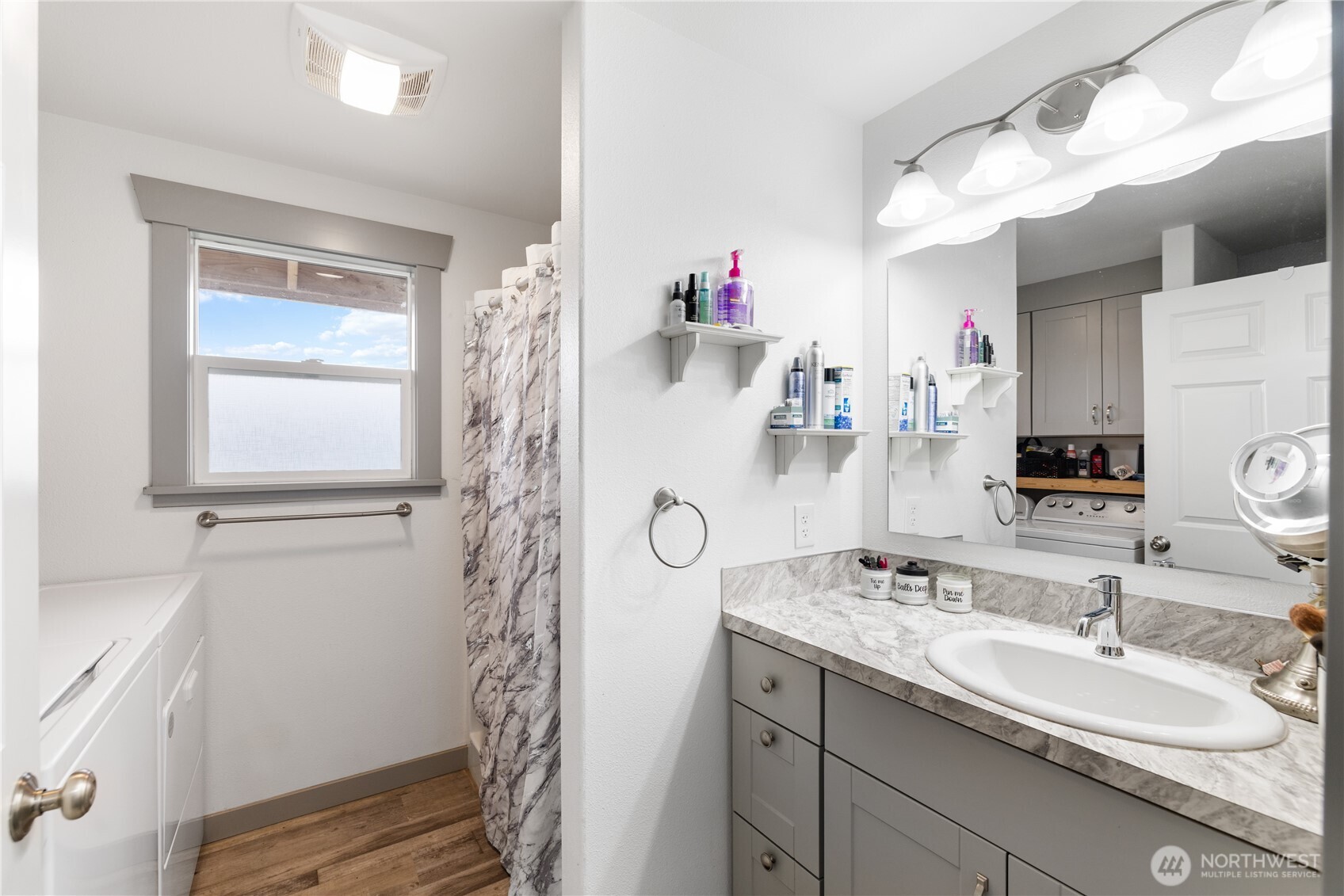 21563-21567 Cook Road Sedro-Woolley, WA 98284 - Photo 31 of 38 a bathroom with a double vanity sink mirror and shower