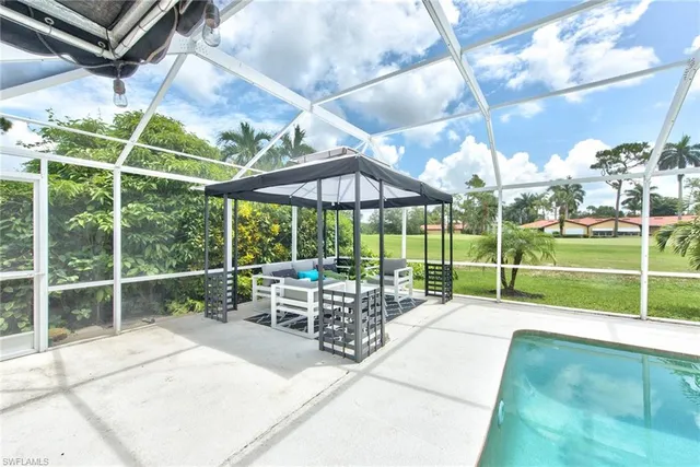 a view of a patio with a backyard