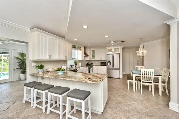 a view of a dining room kitchen and a window