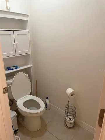 a bathroom with a toilet and a sink