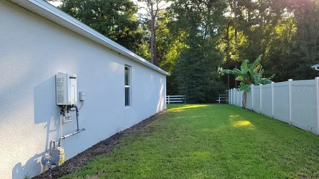 a view of a kid s in front of a house