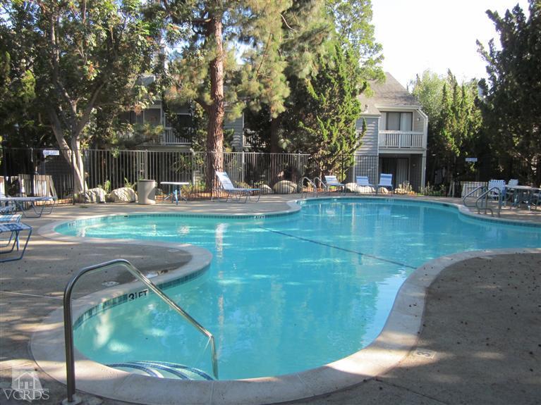 735 Arneill Road Camarillo, CA 93010 - Photo 17 of 21 a view of a swimming pool with sitting area