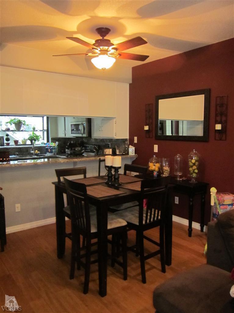 735 Arneill Road Camarillo, CA 93010 - Photo 7 of 21 a view of a dinning tables and chairs in the patio
