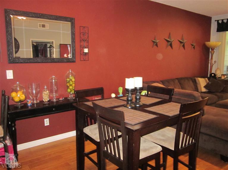 735 Arneill Road Camarillo, CA 93010 - Photo 9 of 21 a view of a dining room with furniture and wooden floor