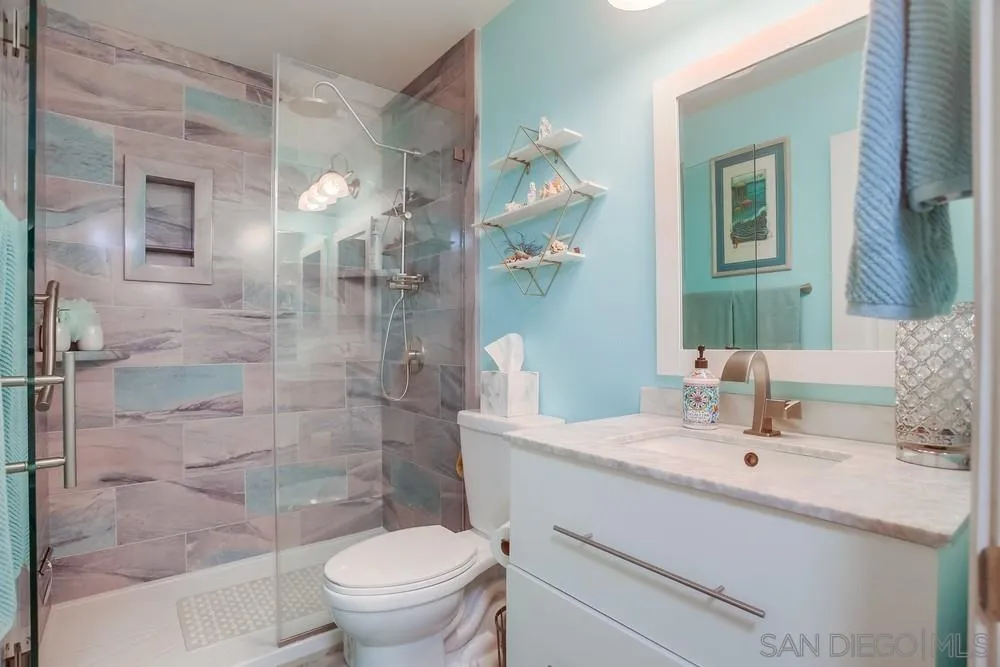 157 Mangano Circle Encinitas, CA 92024 - Photo 18 of 28 a bathroom with a sink a toilet and shower