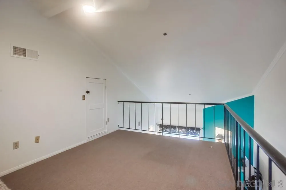 157 Mangano Circle Encinitas, CA 92024 - Photo 20 of 28 a view of an empty room with stairs
